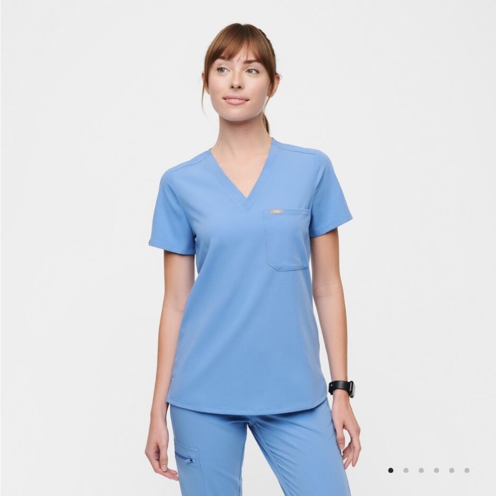 Figs cell blue one pocket scrub top. Barely worn.